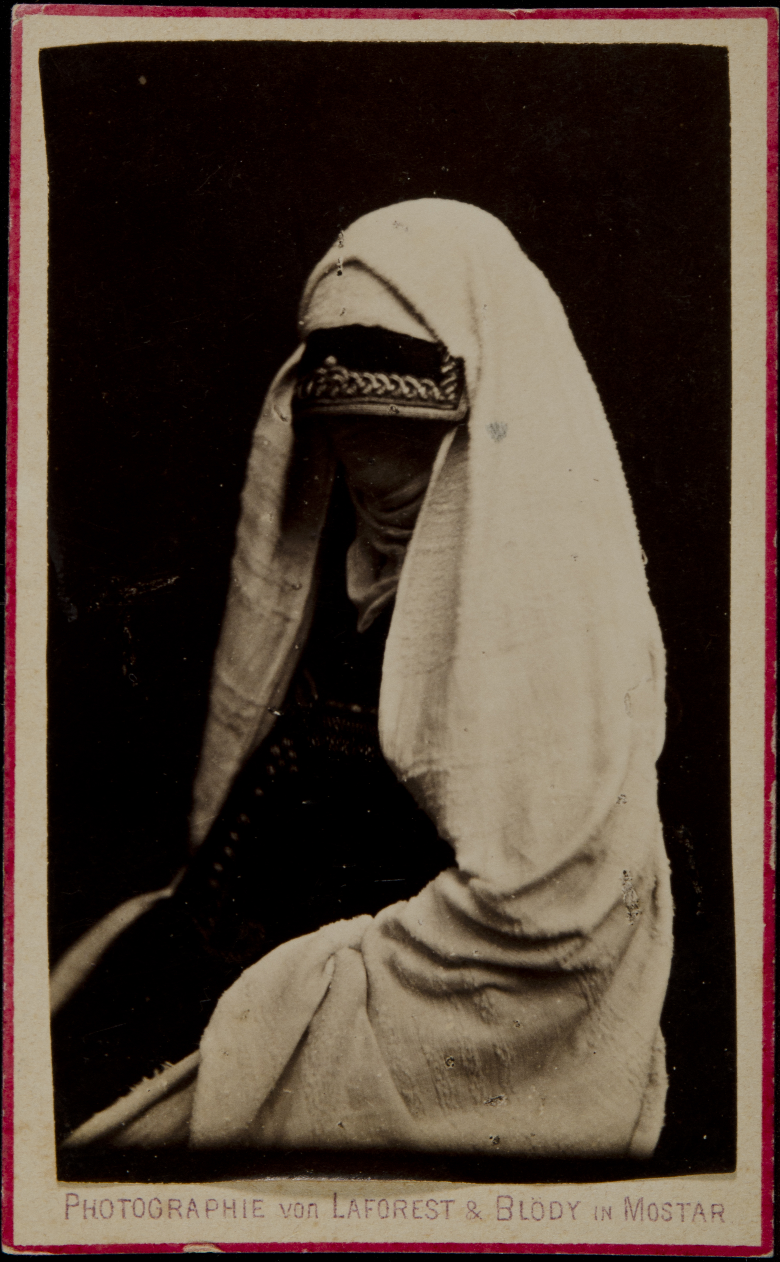 Untitled [Muslim? woman with covered face]