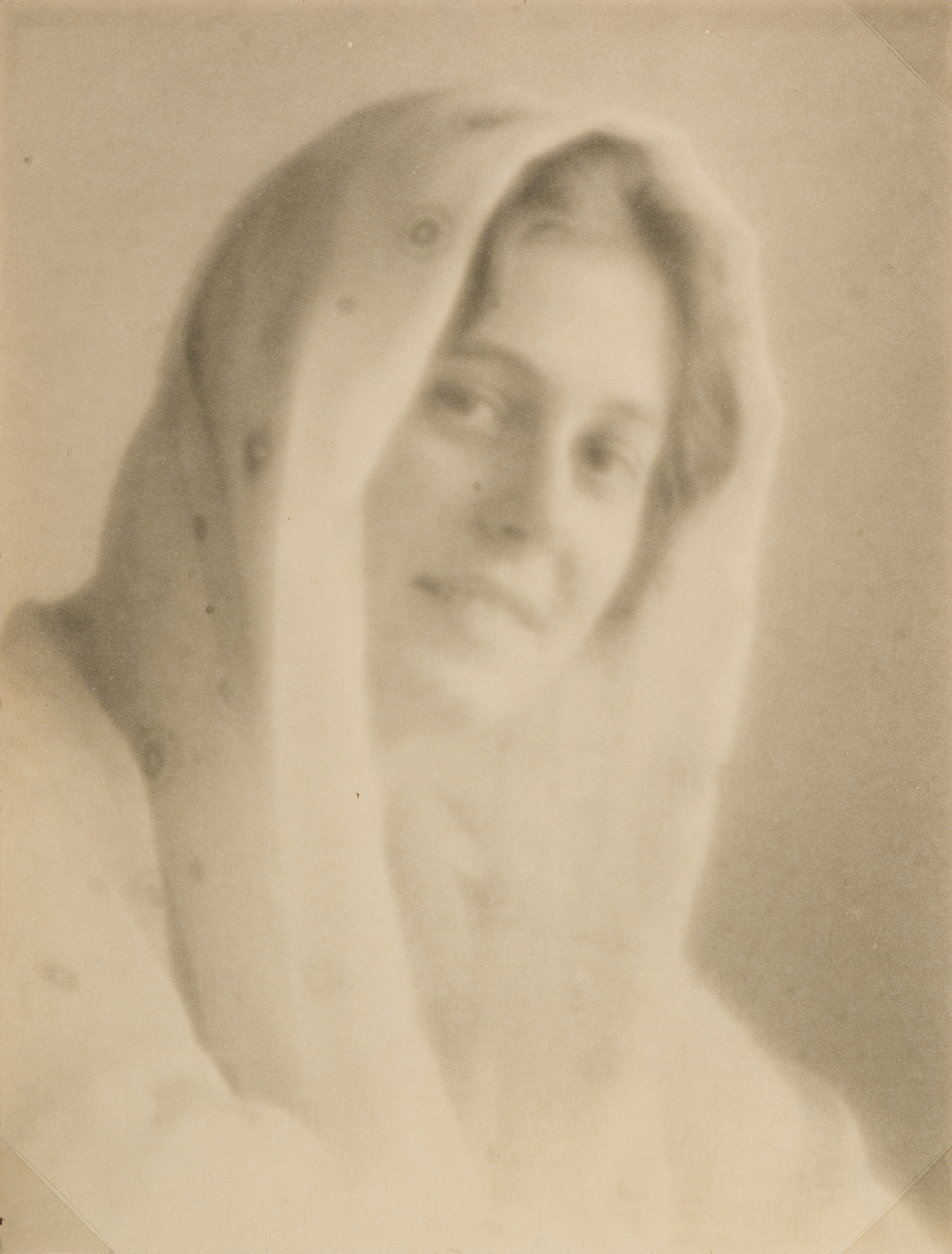 Gladys Shields, scarf draped on head