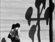 Two women, A Large Blind and Shadows