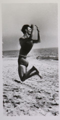 Untitled [Man jumping on beach]