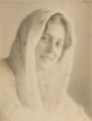 Gladys Shields, scarf draped on head
