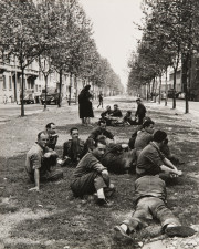 Workers resting on grass
