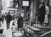 Children in masks, Hotel Belvedere in background, NY