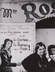 Woman in front of signage, France