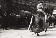 Bullfighter on horse, spectators