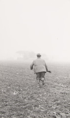 Heavy man running through field