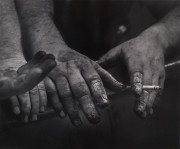 Hands of Firestone tire builders
