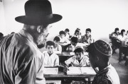 Teacher and his class in a religious village school, Beer-sheba, Negev, Israel