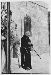 Monk outside church, Jerusalem, Israel