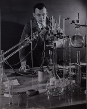 Chemist with laboratory equipments