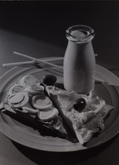 Untitled [Still-life with milk bottle and egg sandwich]