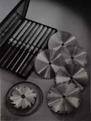 Still life with Disston table saw blades and a box of turning chisels