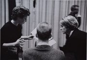 White House secretaries Barbara Coleman and Meredith Burch going over a clipboard at a theatre