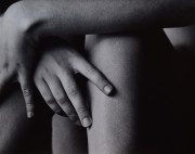 Nude fragment (hands on knees)