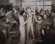 Three women working in mannequin factory