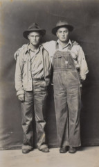 Untitled [Two standing friends, arms around shoulders]