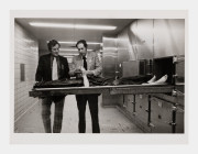 Detective breaking corpse's fingers for fingerprinting, New York City Morgue