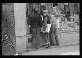 Newsboys Admiring Sporting Goods, Jackson, April 1936