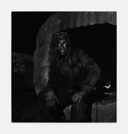 Untitled [Seated Man in Flannel]