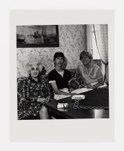 Untitled [Two Women and Young Man Seated]