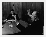 French film director Francois Truffaut (left) and British film director Alfred Hitchcock (right) seated at table talking, California