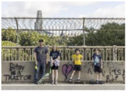 Dylan Vitone with children Lena, August, and Walker out to get spotted lanternflies,  Pittsburgh, Pennsylvania