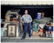 : David Vitone at his garage filled with possessions of wife, Lisa Bishop, who has recently  moved out to live with her parents in north Texas, Akron, Ohio